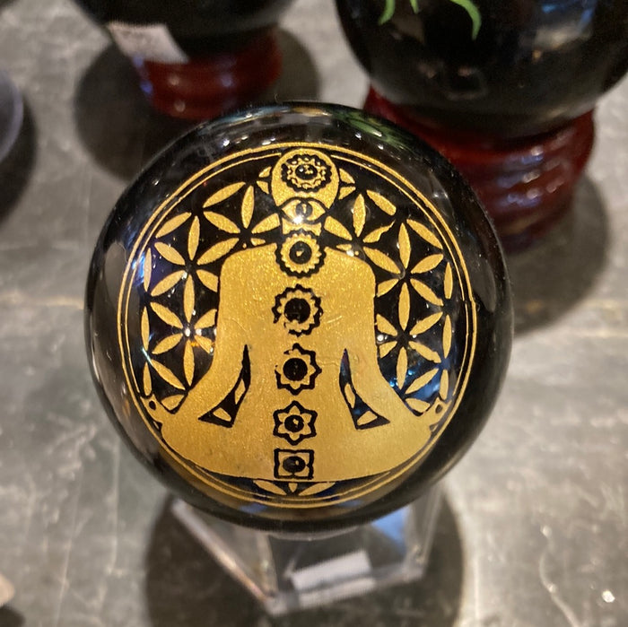 Black obsidian sphere with design