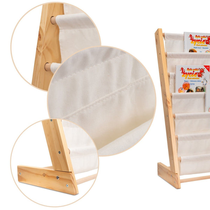 Angled view of the natural pine kids sling bookcase showing its front-facing canvas book shelves