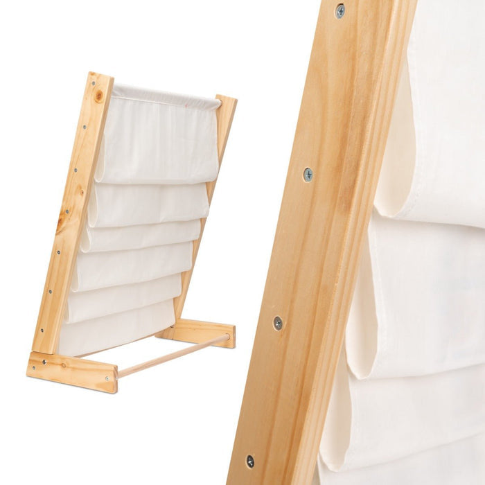 Close-up of the wide wooden base that keeps the kids sling bookcase stable on the floor