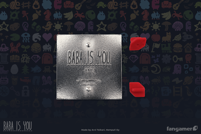 The back of Baba Is Pin against a pattern of Baba Is You sprites. It attaches with two spurs, aligned vertically.