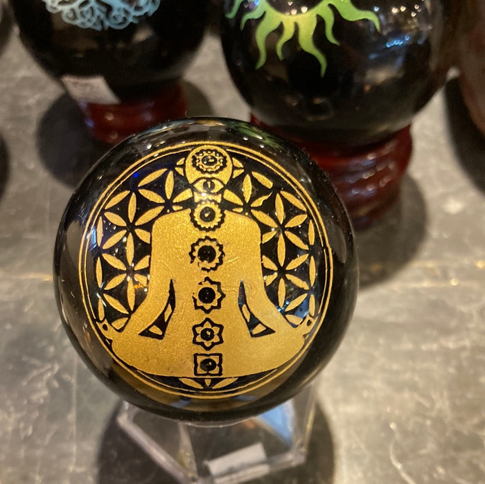 Black obsidian sphere with design
