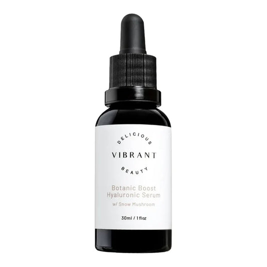 30ml black glass dropper bottle of Vibrant Beauty Botanic Boost Hyaluronic Serum with a white label.