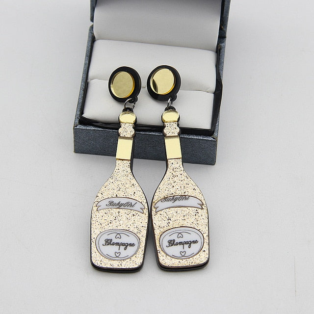 Glitter Repellent Spray & Champagne Bottle Drop Earrings
