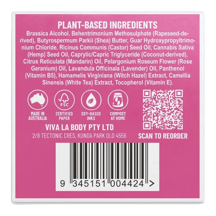 The back of a product box showing a pink panel with ingredient list text, certification icons, a QR code, and a barcode.