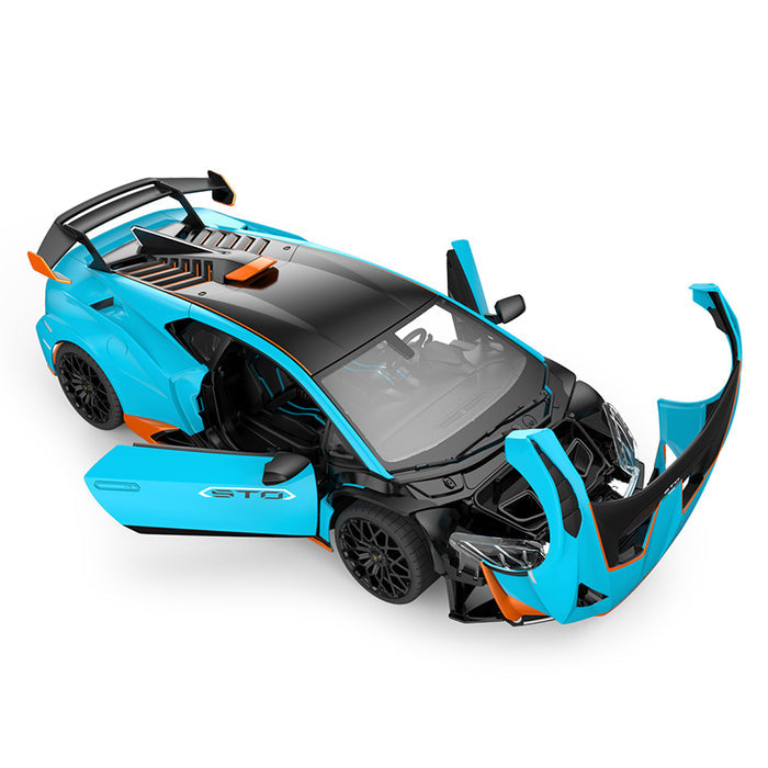 Rastar 1:14 Lamborghini Huracan STO RC car in sky blue with orange accents viewed from an elevated overhead rear 3/4 angle with Cofango hood and both doors open. The image showcases all opening features simultaneously — the flipped-forward Cofango front hood, scissor-style doors, rear wing, and orange accents on the roof vents.